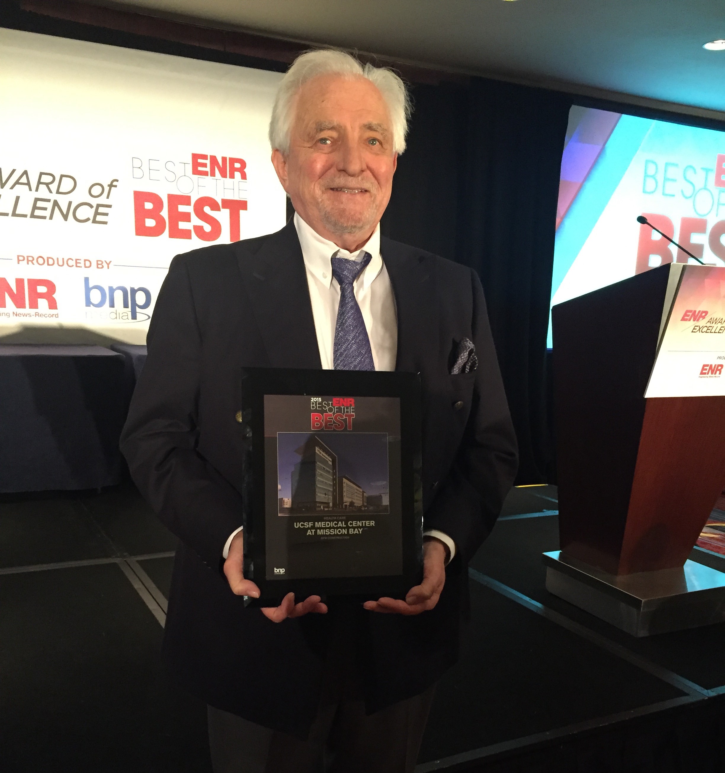 Stuart Eckblad, Vice President of Health Major Capital Projects for UCSF Real Estate, accepts an award from the Engineering News Record for the UCSF Medical Center at Mission Bay