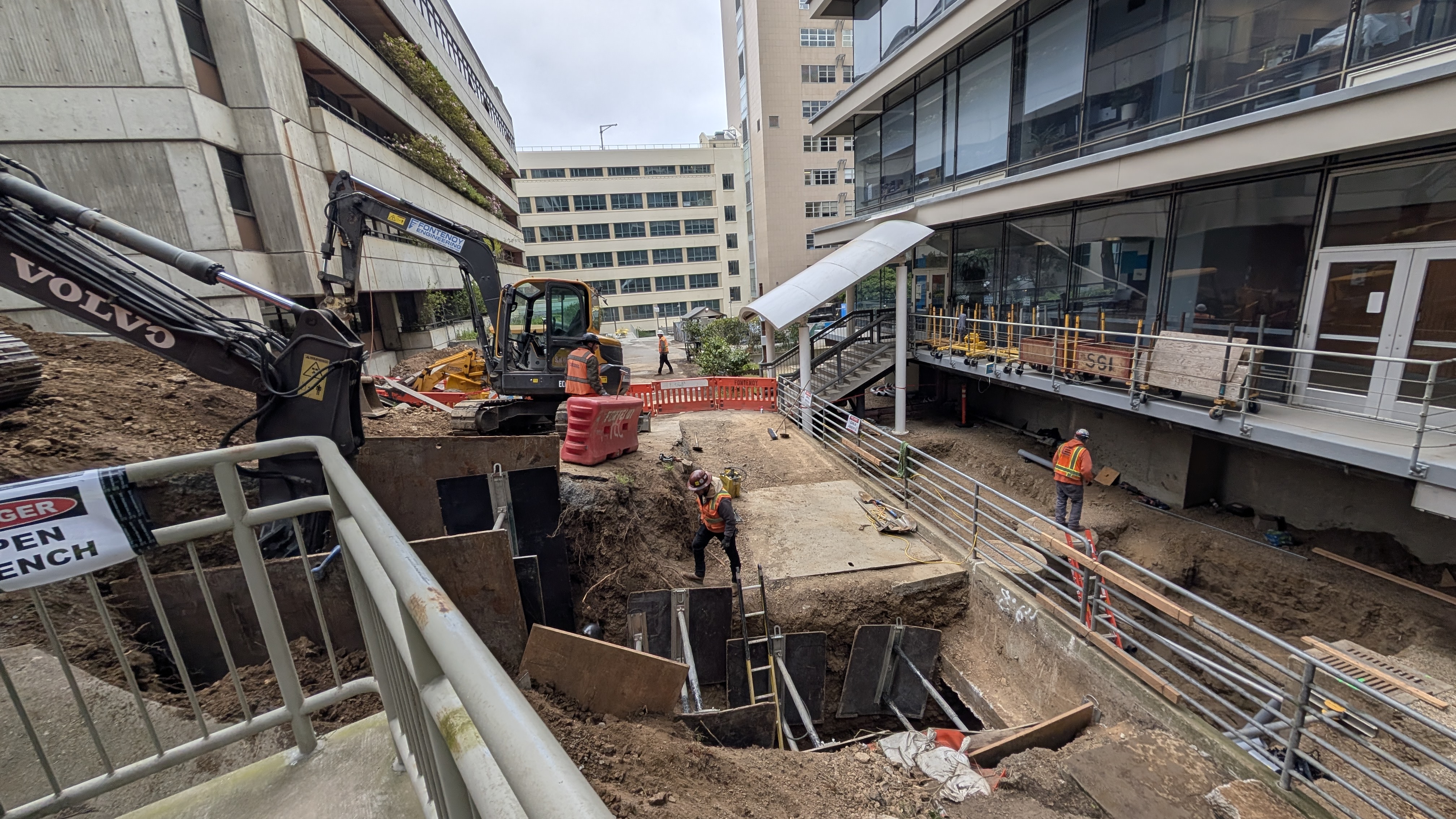 Ongoing electrical duct bank work surrounding the SON building in May 2025